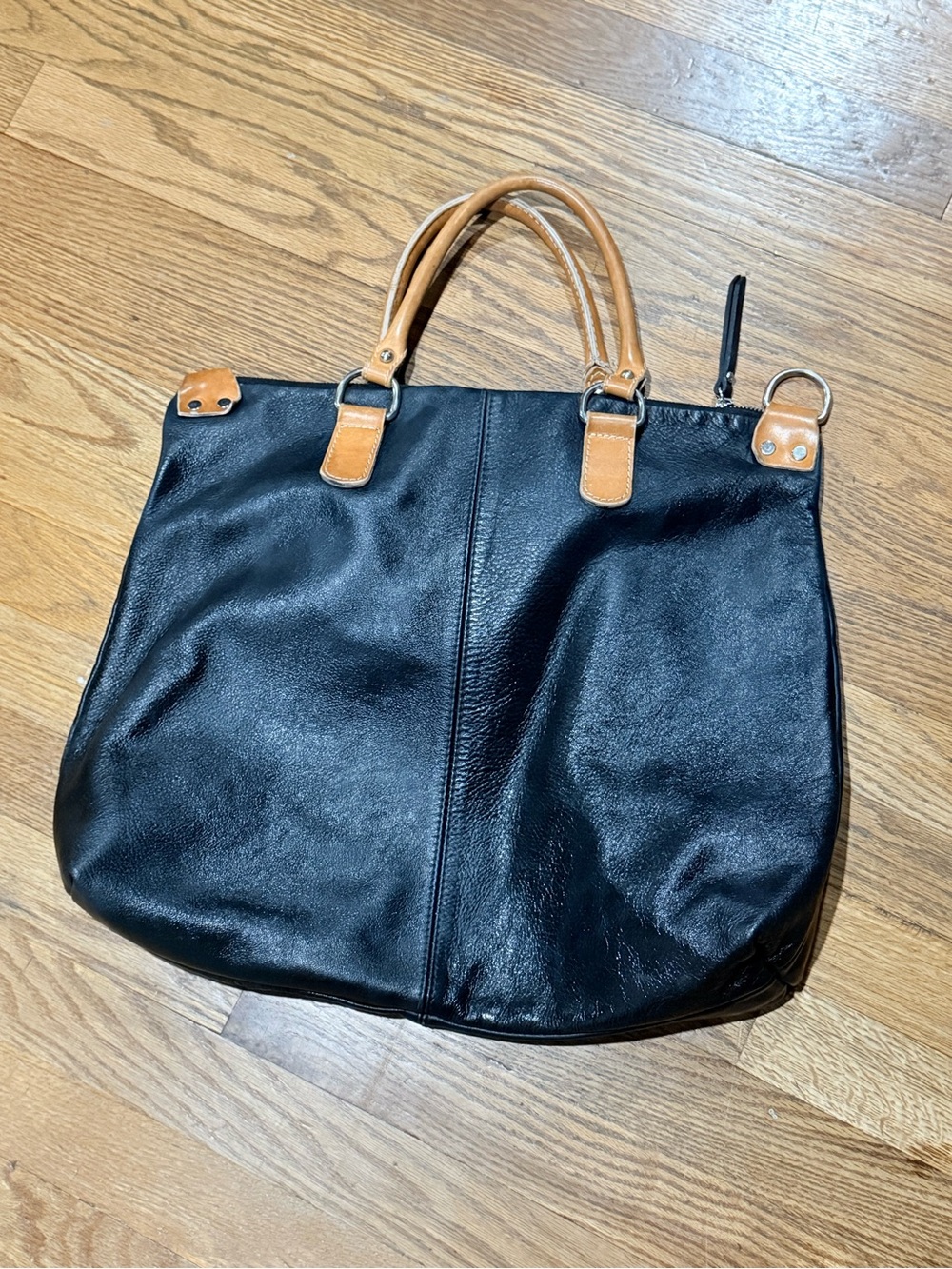 Pulicati Italian black pebbled leather shoulder bag with tan handles